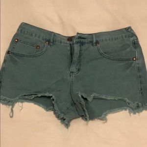 Blue green free people distressed shorts